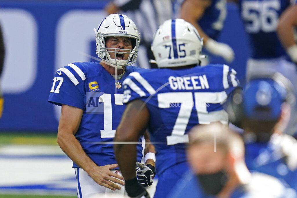 Michael Conroy Indianapolis Colts quarterback Philip Rivers (17) reacts after throwing a touchdown pass during the second half of an NFL football game against the Minnesota Vikings, Sunday, Sept. 20, 2020, in Indianapolis. (AP Photo/Michael Conroy)