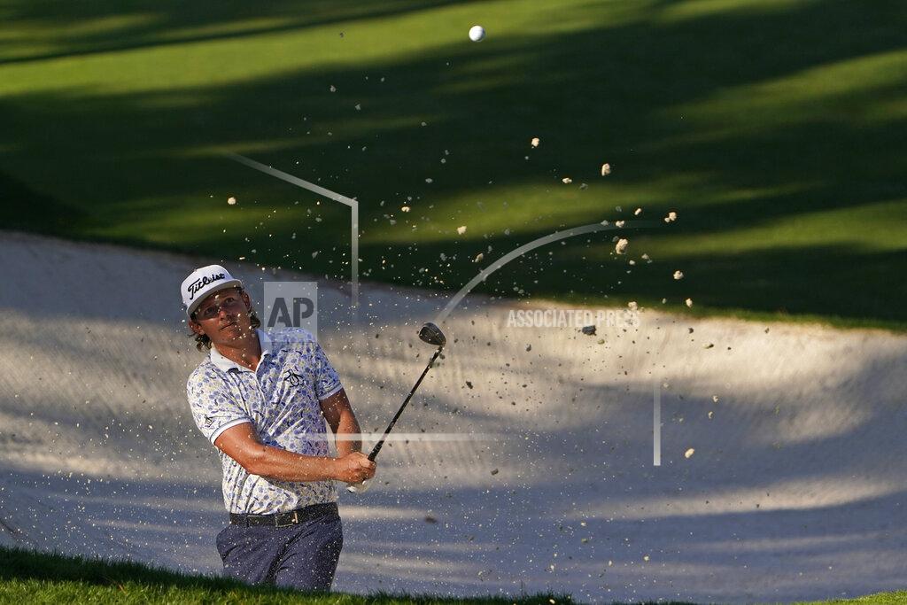 Chris Carlson Cameron Smith, of Australia, hits out of a bunker not the 10th hole during the third round of the Masters golf tournament Saturday, Nov. 14, 2020, in Augusta, Ga. (AP Photo/Chris Carlson)