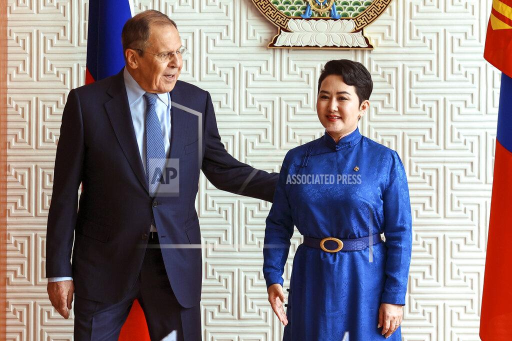 Uncredited In this photo released by Russian Foreign Ministry Press Service, Mongolian Foreign Minister Batmunkh Battsetseg and Russian Foreign Minister Sergey Lavrov pose for a photo prior to their talks in Ulaanbaatar, Mongolia, Tuesday, July 5, 2022. (Russian Foreign Ministry Press Service via AP)