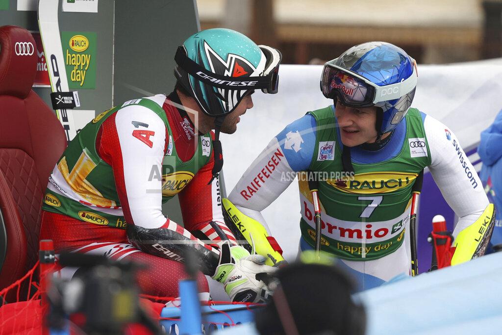 Luciano Bisi Austria's Vincent Kriechmayr, left, talks with Switzerland's Marco Odermatt at the finish line during an alpine ski men's World Cup super-G, in Bormio, Italy, Wednesday, Dec. 29, 2021. (AP Photo/Luciano Bisi)