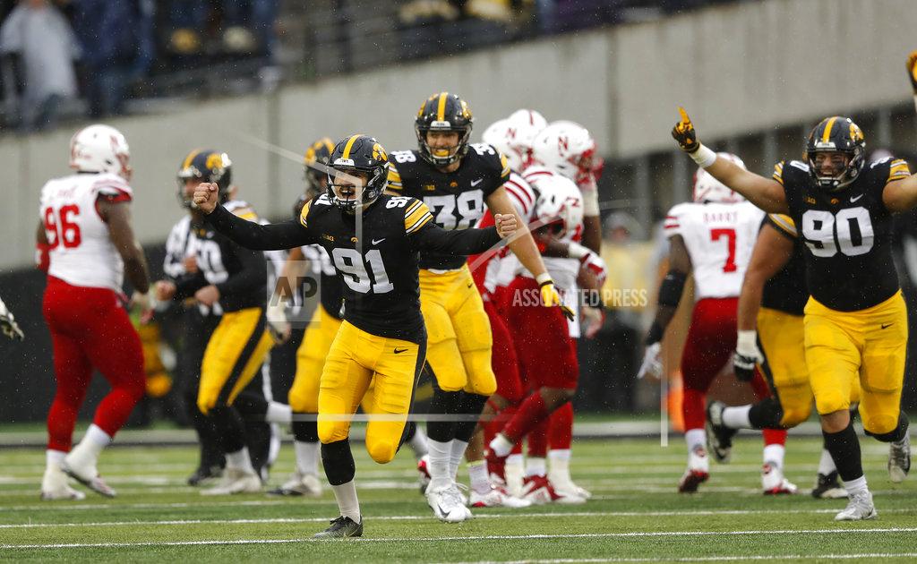 Charlie Neibergall Iowa place kicker Miguel Recinos (91) celebrates after kicking a 41-yard field goal on the final play of an NCAA college football game against Nebraska, Friday, Nov. 23, 2018, in Iowa City, Iowa. Iowa won 31-28. (AP Photo/Charlie Neibergall)