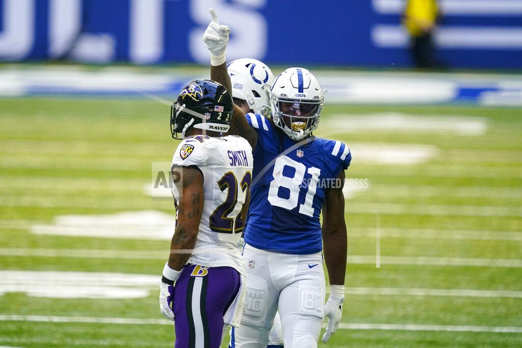 Darron Cummings Indianapolis Colts tight end Mo Alie-Cox (81) signals a first down against the Baltimore Ravens in the first half of an NFL football game in Indianapolis, Sunday, Nov. 8, 2020. (AP Photo/Darron Cummings)