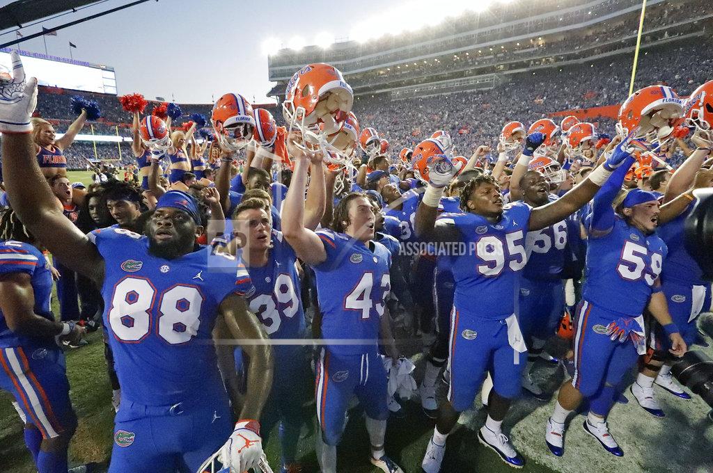 John Raoux Florida players celebrate in front of fans after defeating LSU 27-19 in an NCAA college football game Saturday, Oct. 6, 2018, in Gainesville, Fla. (AP Photo/John Raoux)