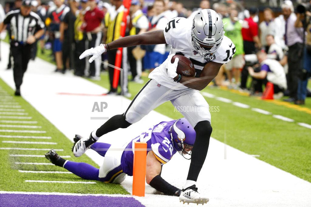Bruce Kluckhohn Oakland Raiders wide receiver J.J. Nelson (15) catches a 29-yard touchdown pass ahead of Minnesota Vikings free safety Harrison Smith, rear, during the first half of an NFL football game, Sunday, Sept. 22, 2019, in Minneapolis. (AP Photo/Bruce Kluckhohn)