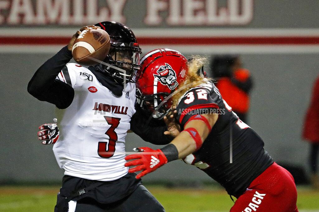 Karl B Deblaker North Carolina State's Drake Thomas (32) sacks Louisville quarterback Micale Cunningham (3) during the first half of an NCAA college football game in Raleigh, N.C., Saturday, Nov. 16, 2019. (AP Photo/Karl B DeBlaker)