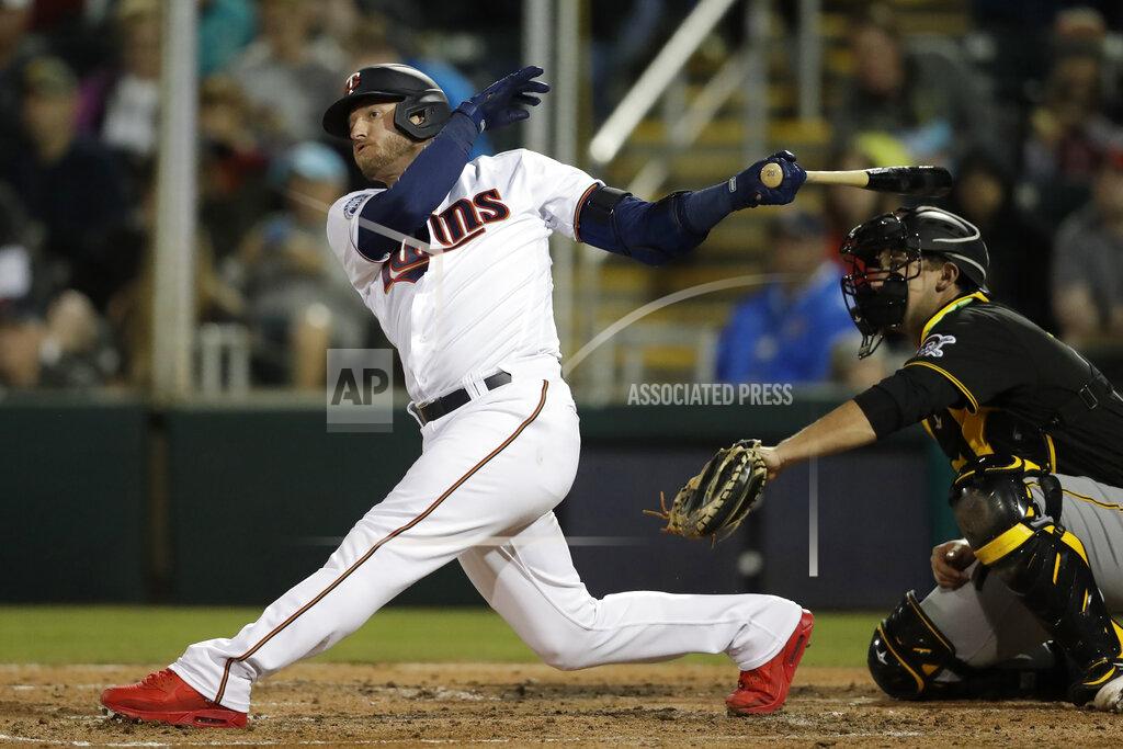 John Bazemore FILE - Minnesota Twins' Josh Donaldson follows through on a double as Pittsburgh Pirates catcher Andrew Susac looks on in the third inning of a spring training baseball game in Fort Myers, Fla., in this Saturday, Feb. 29, 2020, file photo. When Josh Donaldson was on the field in his first season with Minnesota, he produced and contributed the way the Twins planned. The problems were the pandemic-shortened schedule and the nagging calf injury that limited Donaldson to 28 games in 2020. He and the team are banking on a healthier year.(AP Photo/John Bazemore, File)