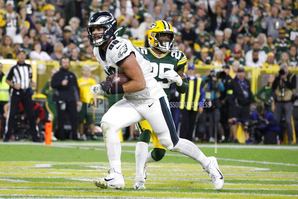 Jeffrey Phelps Philadelphia Eagles tight end Dallas Goedert catches a pass for a touchdown while being covered by Green Bay Packers cornerback Will Redmond during the first half of an NFL football game Thursday, Sept. 26, 2019, in Green Bay, Wis. (AP Photo/Jeffrey Phelps)