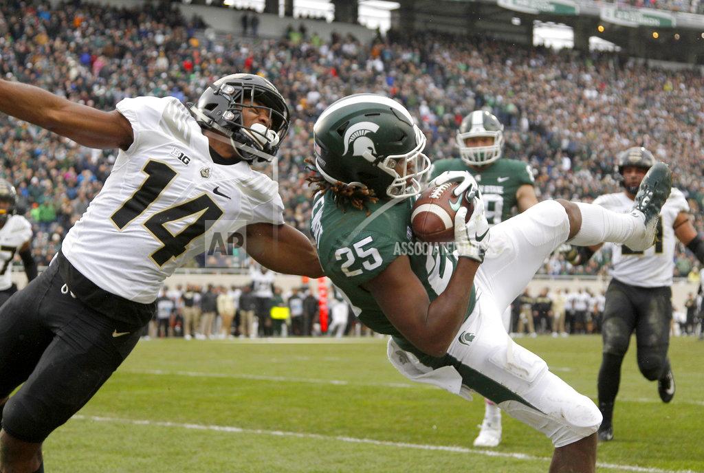 Al Goldis Michigan State receiver Darrell Stewart (25) pulls in a pass in the end zone but comes down with a foot out of bounds against Purdue cornerback Antonio Blackmon (14) during the second quarter of an NCAA college football game, Saturday, Oct. 27, 2018, in East Lansing, Mich. (AP Photo/Al Goldis)