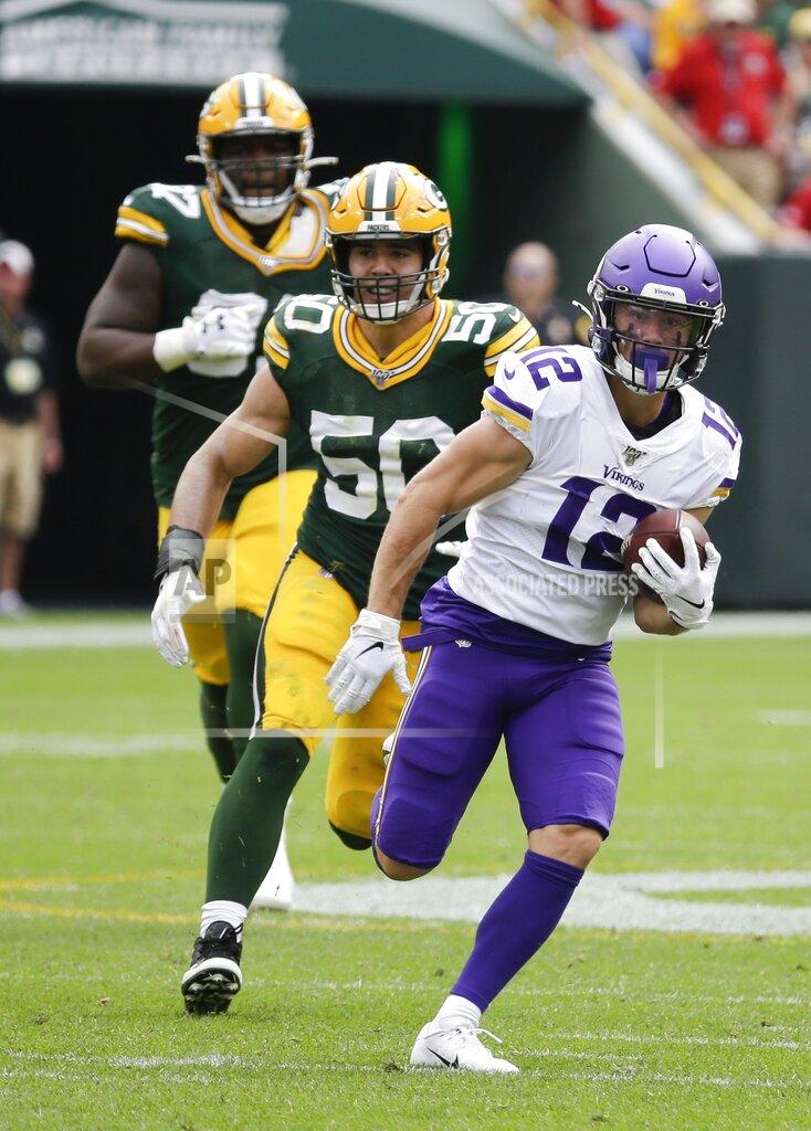 Mike Roemer Minnesota Vikings' Chad Beebe breaks away from Green Bay Packers' Blake Martinez for a long gain during the first half of an NFL football game Sunday, Sept. 15, 2019, in Green Bay, Wis. (AP Photo/Mike Roemer)
