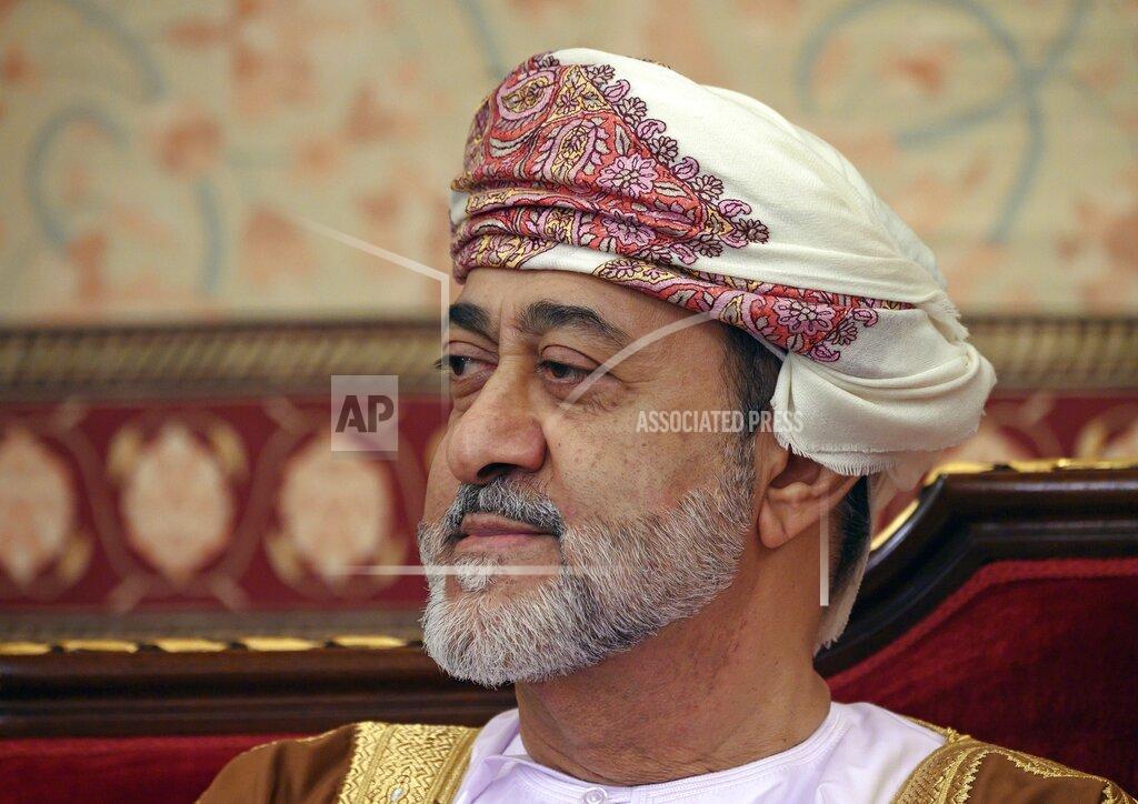 Andrew Caballero-Reynolds FILE - In this Feb. 21, 2020 file photo, Oman's ruler Sultan Haitham bin Tariq prepares for a meeting at al-Alam palace in the capital Muscat, Oman. The sultan announced Monday, Jan. 11, 2021, a shake-up of the country’s constitution with changes that include the appointment of a crown prince for the first time and steps to boost government transparency. The move, one year after the death of Sultan Qaboos bin Said comes as the government faces growing economic pressures at home. (Andrew Caballero-Reynolds/Pool via AP, File)