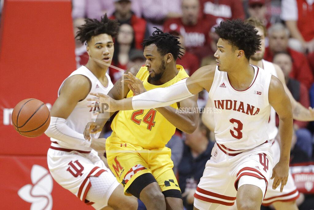 Darron Cummings Maryland's Donta Scott (24) and Indiana's Justin Smith (3) eye the ball during the first half of an NCAA college basketball game, Sunday, Jan. 26, 2020, in Bloomington, Ind. (AP Photo/Darron Cummings)