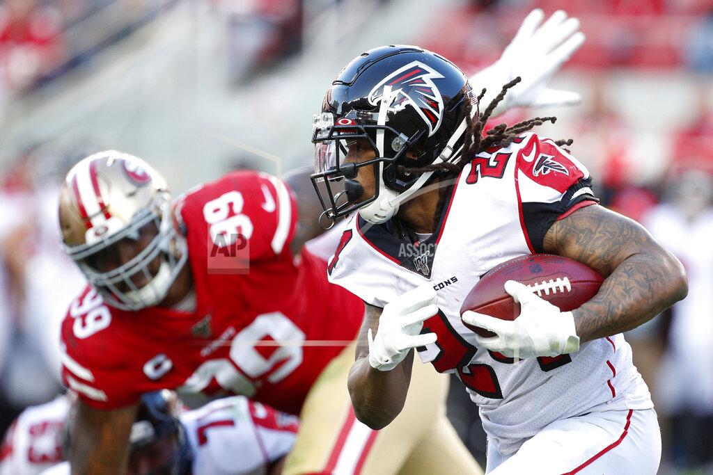 Josie Lepe Atlanta Falcons running back Devonta Freeman (24) runs in front of San Francisco 49ers defensive tackle DeForest Buckner (99) during the second half of an NFL football game in Santa Clara, Calif., Sunday, Dec. 15, 2019. (AP Photo/Josie Lepe)