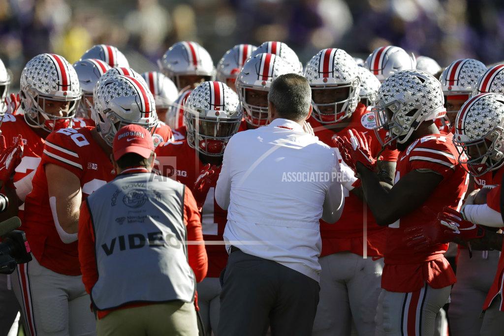 Marcio Jose Sanchez Ohio State head coach Urban Meyer talks with the team during warm ups before the Rose Bowl NCAA college football game against Washington Tuesday, Jan. 1, 2019, in Pasadena, Calif.(AP Photo/Marcio Jose Sanchez)