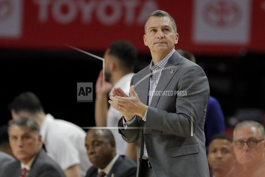 Julio Cortez Maryland head coach Mark Turgeon looks on during the first half of an NCAA college basketball game against Holy Cross, Tuesday, Nov. 5, 2019, in College Park, Md. (AP Photo/Julio Cortez)
