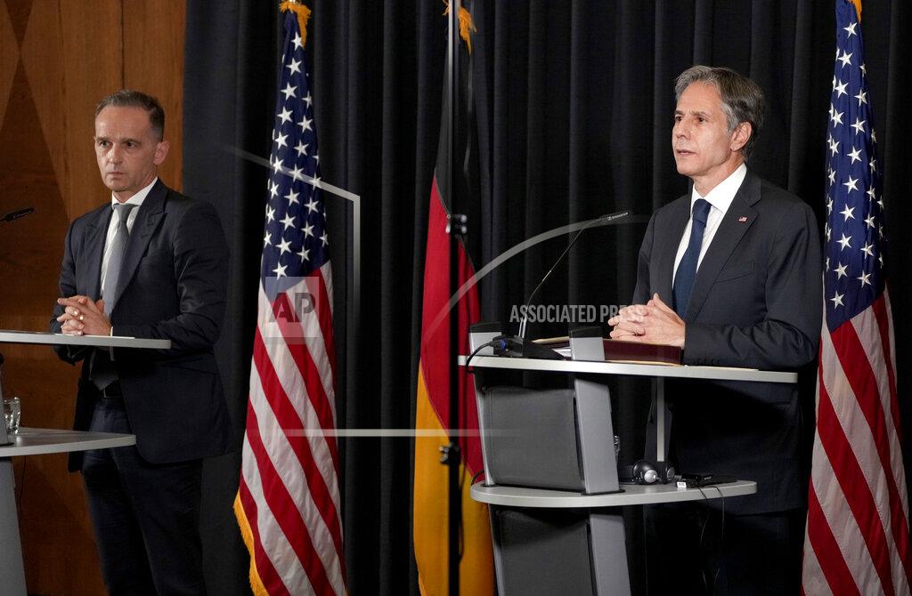 Michael Probst US Secretary of State, Antony Blinken, right, and German Foreign Minister Heiko Maas, left, address the media during a joint press conference after a meeting at the Ramstein U.S. Air Base in Ramstein, Germany, Wednesday, Sept. 8, 2021. The largest American military community overseas houses thousands Afghan evacuees in a tent city at the airbase. (AP Photo/Michael Probst)