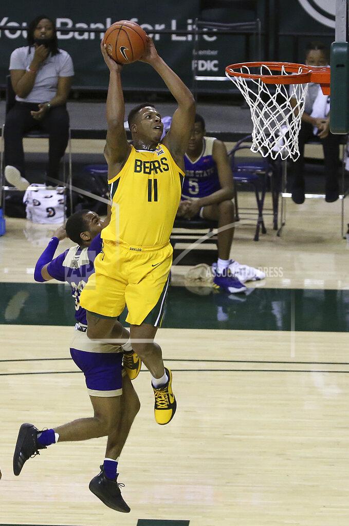 Jerry Larson Baylor guard Mark Vital (11) scores past Alcorn State guard Byron Joshua (30) in the first half of an NCAA college basketball game, Wednesday, Dec. 30, 2020, in Waco, Texas. (AP Photo/ Jerry Larson)