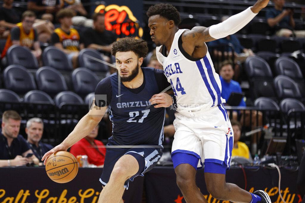 Jeff Swinger Memphis Grizzlies forward David Roddy (27) drives against Philadelphia 76ers forward Paul Reed Jr. (44) during the first half of an NBA summer league basketball game Tuesday, July 5, 2022, in Salt Lake City. (AP Photo/Jeff Swinger)