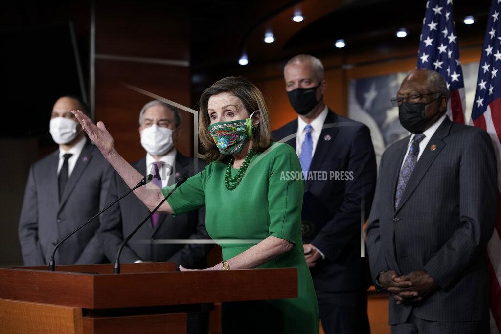 J. Scott Applewhite Speaker of the House Nancy Pelosi, D-Calif., meets with reporters before the House votes to pass a $1.9 trillion pandemic relief package, during a news conference at the Capitol in Washington, Friday, Feb. 26, 2021. (AP Photo/J. Scott Applewhite)