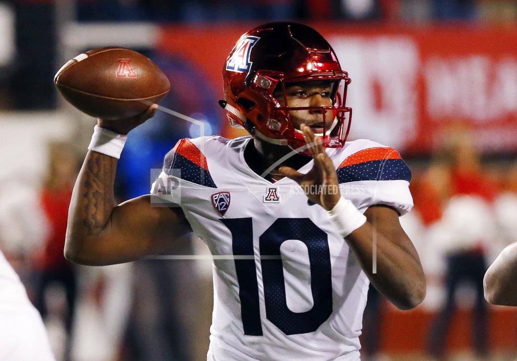 Rick Bowmer Arizona quarterback Jamarye Joiner (10) throws a pass against Utah during the first half of an NCAA college football game Friday, Oct. 12, 2018, in Salt Lake City. (AP Photo/Rick Bowmer)