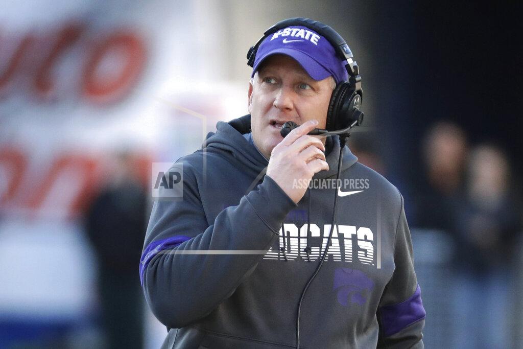 Mark Humphrey FILE - In this Dec. 31, 2019, file photo, Kansas State coach Chris Klieman watches from the sideline during the first half of the team's Liberty Bowl NCAA college football game against Navy in Memphis, Tenn. The Big Ten and Pac-12 became the first Power Five conferences to cancel their fall football seasons because of concerns about COVID-19. The announcements left the Atlantic Coast Conference, the Southeastern Conference and the Big 12 as thePower Five conferences still intending to play in the fall, and left Klieman clinging to hope. “I hope they don't totally lose a season," he said of his players. (AP Photo/Mark Humphrey, File)