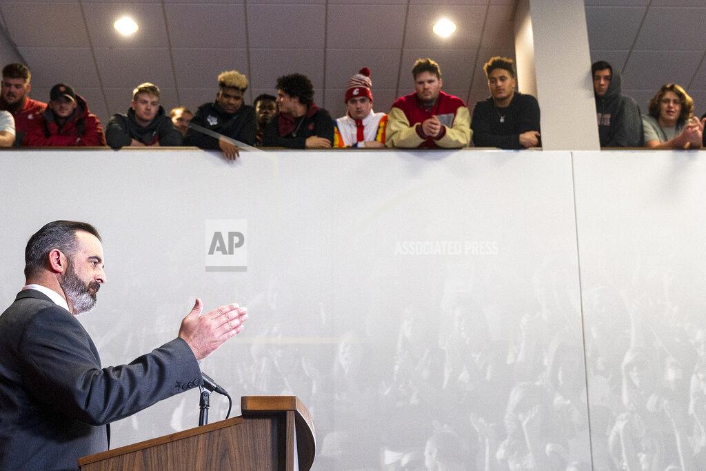 Pete Caster New Washington State football coach Nick Rolovich speaks during a press conference as players from the team look on from a balcony Thursday, Jan. 16, 2020, in Pullman, Wash. (Pete Caster/Lewiston Tribune via AP)