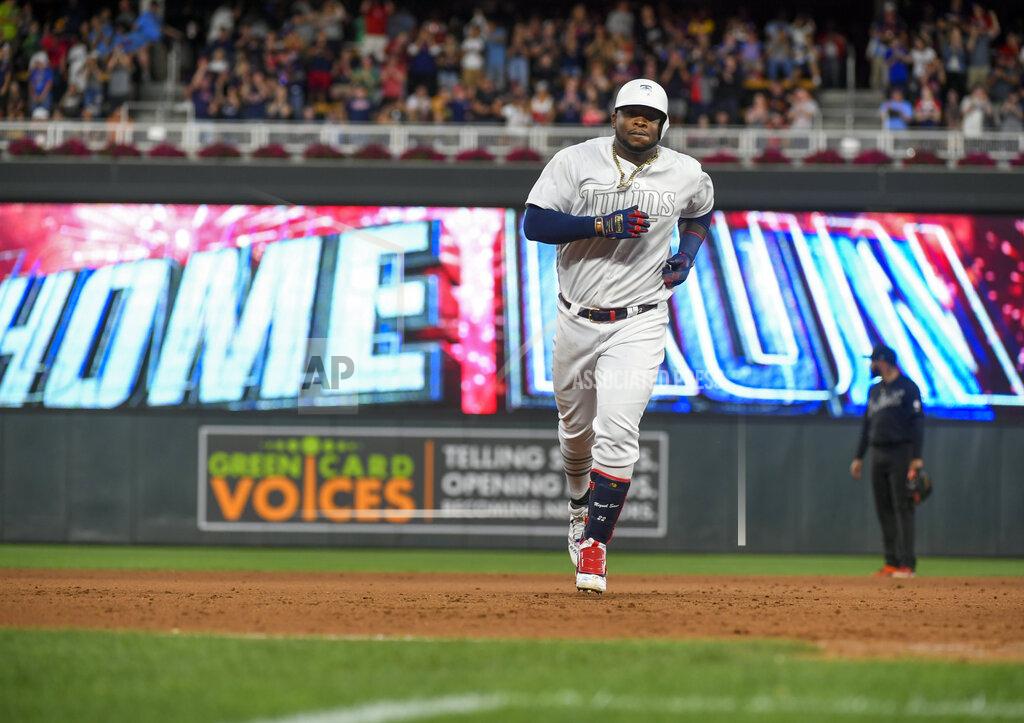 Craig Lassig Minnesota Twins Miguel Sano rounds the bases after hitting a three-run home run against the Detroit Tigers during the fifth inning of a baseball game Saturday, Aug. 24, 2019, in Minneapolis. The Twins won 8-5. (AP Photo/Craig Lassig)