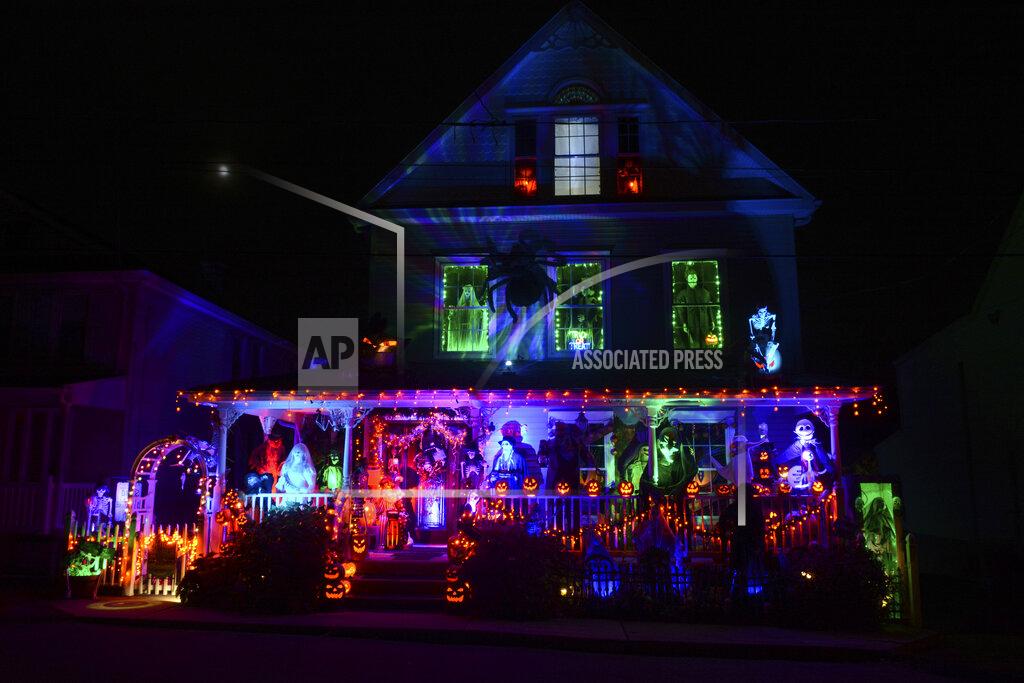 Lindsey Shuey A house along Park Avenue in the Schoentown section of Port Carbon, Pa., is covered in Halloween decorations on Wednesday, Oct. 28, 2020. The backyard is also decorated. (Lindsey Shuey/The Republican-Herald via AP)
