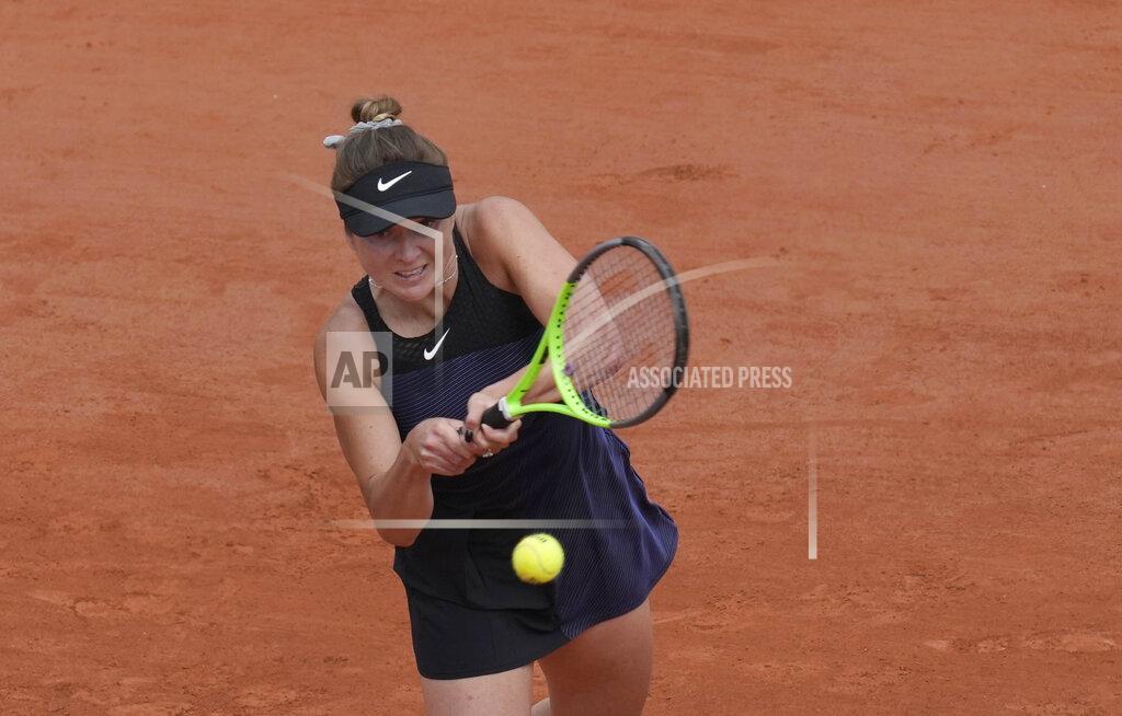 Christophe Ena Ukraine's Elina Svitolina plays a return to United States Ann Li during their second round match on day 5, of the French Open tennis tournament at Roland Garros in Paris, France, Thursday, June 3, 2021. (AP Photo/Christophe Ena)