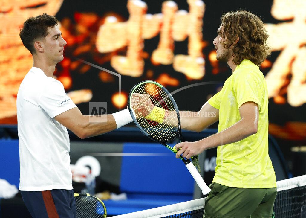 Rick Rycroft Greece's Stefanos Tsitsipas, right, is congratulated by Australia's Thanais Kokkinakis after winning their second round match at the Australian Open tennis championship in Melbourne, Australia, Thursday, Feb. 11, 2021.(AP Photo/Rick Rycroft)