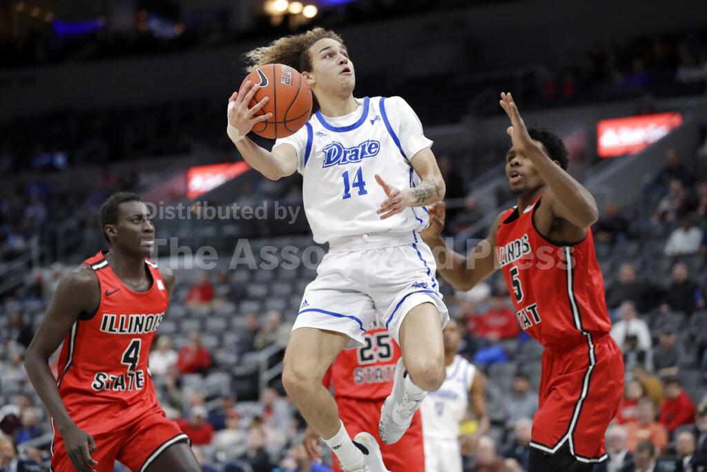 Drake's Noah Thomas (14) heads to the basket past Illinois State's Abdou Ndiaye (4) and Keith Fisher III (5) during the first half of an NCAA college basketball game in the first round of the Missouri Valley Conference men's tournament Thursday, March 5, 2020, in St. Louis. (AP Photo/Jeff Roberson)