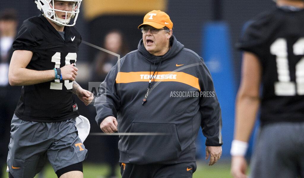 Caitie Mcmekin FILE - In this March 7, 2019, file photo, Tennessee offensive coordinator Jim Chaney walks on the field during Tennessee football's first practice of the spring season in Knoxville, Tenn. Chaney exemplifies the nomadic nature of an SEC coordinator. He’s back for his second stint as Tennessee’s offensive coordinator after holding the same title at Arkansas, Pittsburgh and Georgia since his last stay in Knoxville. (Caitie McMekin/Knoxville News Sentinel via AP, File)