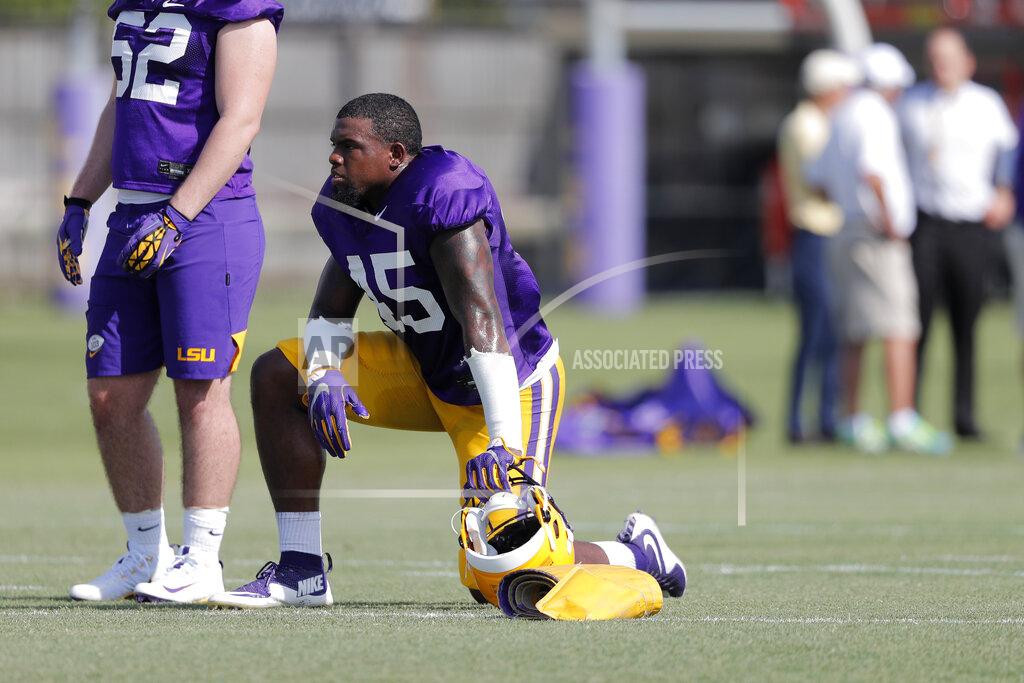 Gerald Herbert LSU linebacker Michael Divinity Jr. (45) works out during their NCAA college football practice in Baton Rouge, La., Wednesday, Aug. 7, 2019. (AP Photo/Gerald Herbert)
