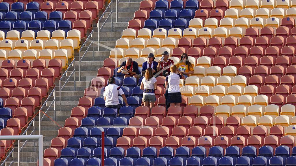 Rick Bowmer A few fans remain in the stands after the scheduled MLS game between Real Salt Lake and Los Angeles FC was postponed Wednesday, Aug. 26, 2020, in Sandy, Utah. Major League Soccer players boycotted five games Wednesday night in a collective statement against racial injustice. The players' action came after all three NBA playoff games were called off in a protest over the police shooting of Jacob Blake in Wisconsin on Sunday night. (AP Photo/Rick Bowmer)