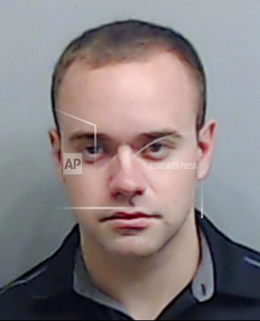 Uncredited In this booking photo made available Thursday, June 18, 2020 by the Fulton County, Ga., Sheriff's Office, shows Atlanta Police Officer Garrett Rolfe. Rolfe, who fatally shot Rayshard Brooks in the back after the fleeing man pointed a stun gun in his direction, was charged with felony murder and 10 other charges. Rolfe was fired after the shooting. (Fulton County Sheriff's Office via AP)