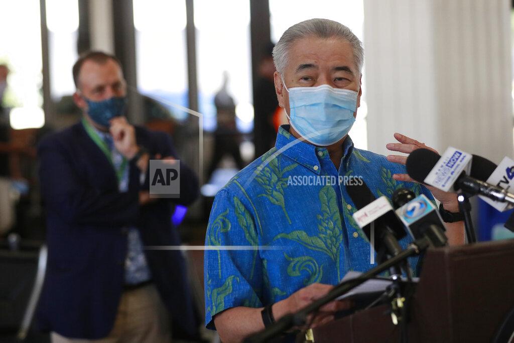 Marco Garcia FILE - In this Oct. 15, 2020, file photo, Hawaii Gov. David Ige speaks at a news conference at the Daniel K. Inouye International Airport in Honolulu. A year after the first coronavirus shutdowns, many U.S. states and cities are still struggling with a silent side effect: Public records have become harder to get. Ige, a Democrat, took the most sweeping action when he suspended the state’s entire open-records law in March 2020. Ige eased the suspension under pressure from open-government advocates. (AP Photo/Marco Garcia, File)