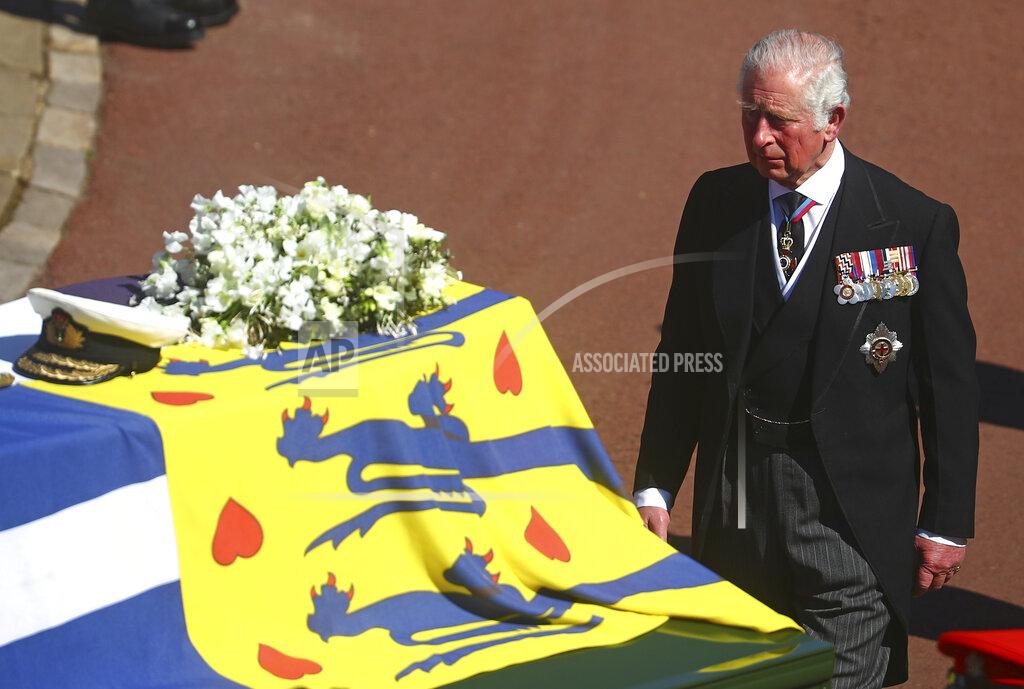 Hannah Mckay Prince Charles follows the coffin of his father Britain's Prince Philip during the funeral inside Windsor Castle in Windsor, England, Saturday, April 17, 2021. Prince Philip died April 9 at the age of 99 after 73 years of marriage to Britain's Queen Elizabeth II. (Hannah McKay/Pool via AP)