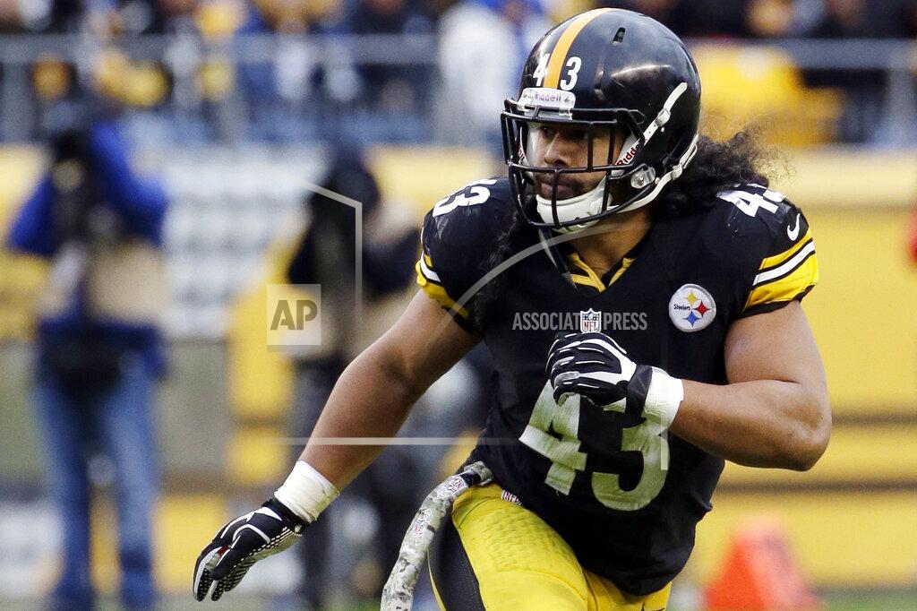 Gene J. Puskar FILE - In this Nov. 10, 2013, file photo, Pittsburgh Steelers' Troy Polamalu follows the action during the second half of an NFL football game against the Buffalo Bills in Pittsburgh. Polamalu was elected into the Pro Football Hall of Fame on Saturday, Feb. 1, 2020. (AP Photo/Gene J. Puskar, File)