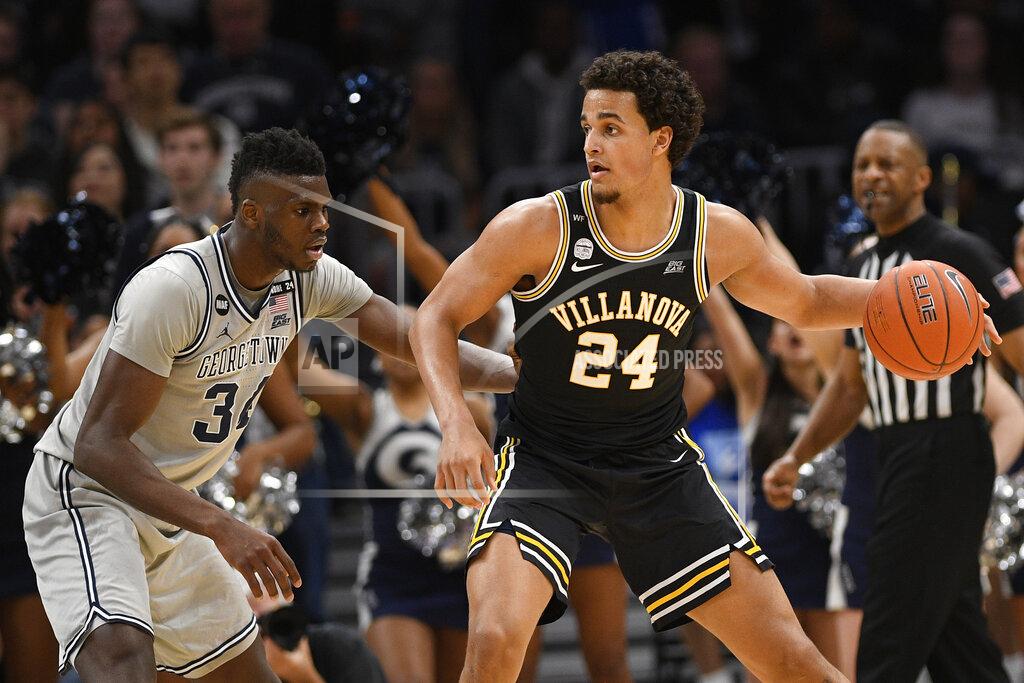 Nick Wass Villanova forward Jeremiah Robinson-Earl (24) dribbles the ball against Georgetown center Qudus Wahab (34) during the second half of an NCAA college basketball game, Saturday, March 7, 2020, in Washington. Villanova won 70-69. (AP Photo/Nick Wass)