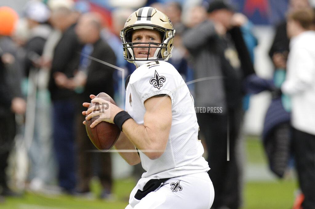 Mark Zaleski FILE - In this Dec. 22, 2019, file photo, New Orleans Saints quarterback Drew Brees warms up for the team's NFL football game against the Tennessee Titans in Nashville, Tenn. Between them, Tom Brady and Brees have played 38 pro football seasons, 39 if you count 2008 when the New England star wrecked his knee in Week 1, and could be doing so against each other on Feb. 2 in a little thing called the Super Bowl. (AP Photo/Mark Zaleski, File)