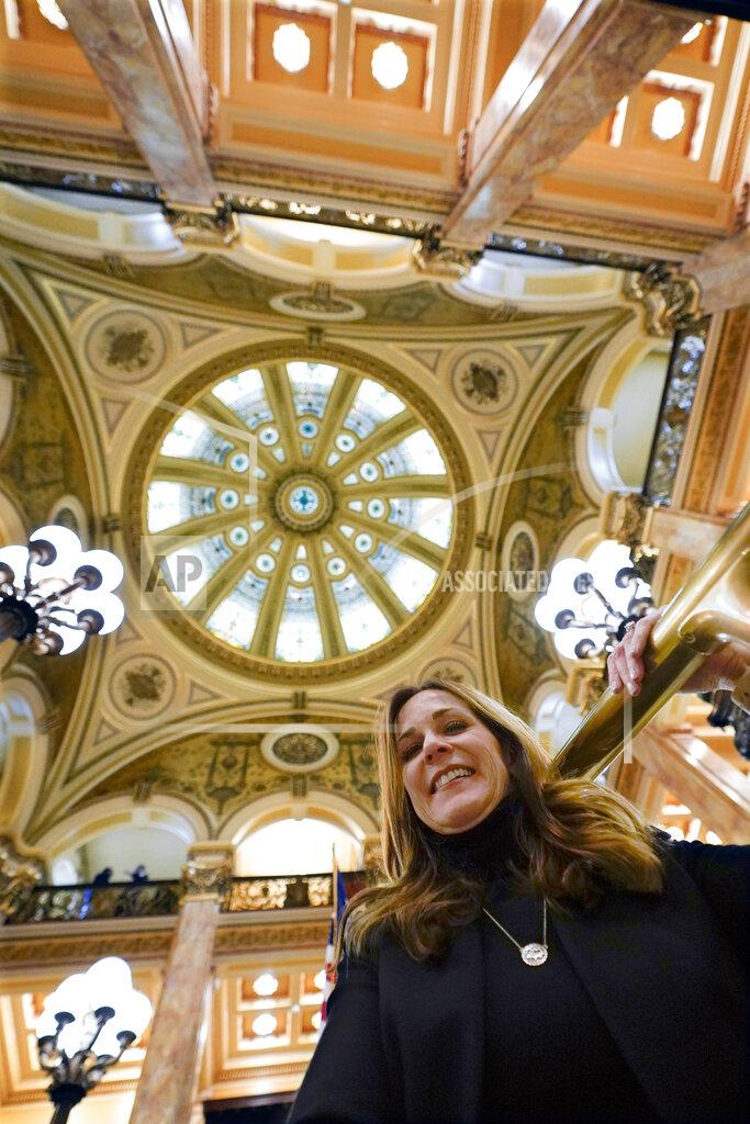 Keith Srakocic Diana Irey Vaughan, chair of the Washington County board of commissioners, poses under the refurbished dome of the county courthouse March 28, 2022, in Washington, Pa. A per-well drilling fee on the state’s booming Marcellus Shale gas industry has rained cash on rural counties and municipalities for nearly a decade. The county has reaped more than $100 million over the past decade. That’s the equivalent of $500 per resident – a “game changer” in the words of Diana Irey Vaughan. The windfall has paid for improvements to public parks, bridges, county buildings and the jail. (AP Photo/Keith Srakocic)