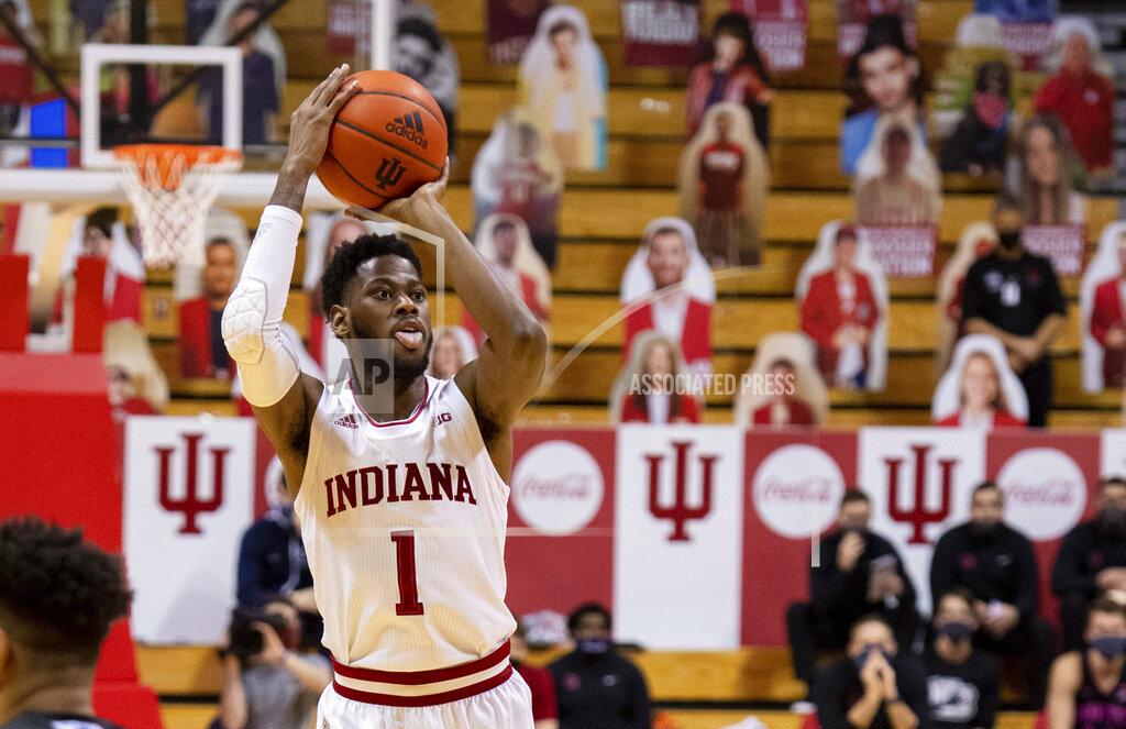 Doug Mcschooler Indiana guard Aljami Durham (1) shoots a three-point basket during the second half of an NCAA college basketball game against Penn State, Wednesday, Dec. 30, 2020, in Bloomington, Ind. Indiana won 87-85 in overtime. (AP Photo/Doug McSchooler)