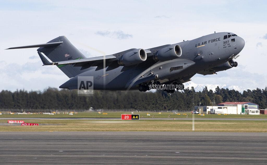 Mark Baker A U.S. Air Force C-17 takes off from Christchurch Airport in the season's first flight to McMurdo Station in Antarctica, Monday, Sept. 14, 2020. The first U.S. flight into Antarctica following months of winter darkness left from New Zealand Monday with crews extra vigilant about keeping out the coronavirus. (AP Photo/Mark Baker)