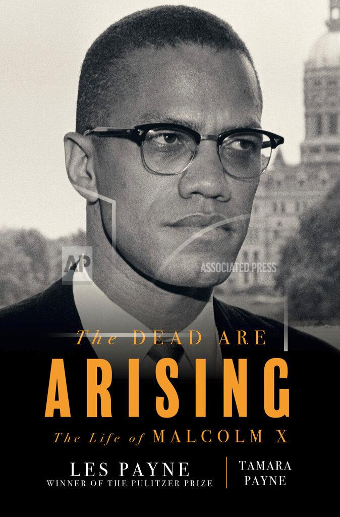 Uncredited This cover image released by Liveright shows "The Dead Are Arising" co-authored by Tamara Payne and her father Les Payne, winner of the Pulitzer Prize for Biography. (Liveright via AP)