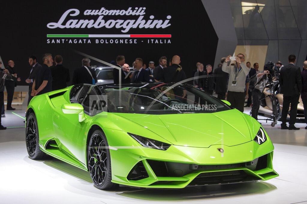 Martial Trezzini The Lamborghini Huracan EVO Spyder is presented during the press day at the '89th Geneva International Motor Show' in Geneva, Switzerland, Tuesday, March 5, 2019. The 'Geneva International Motor Show' takes place in Switzerland from March 7 until March 17, 2019. Automakers are rolling out new electric and hybrid models at the show as they get ready to meet tougher emissions requirements in Europe - while not forgetting the profitable and popular SUVs and SUV-like crossovers. (Martial Trezzini/Keystone via AP)