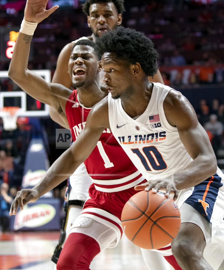 Stephen Haas Illinois guard Andres Feliz (10) drives to the basket past Indiana guard Aljami Durham (1) during the first half of an NCAA college basketball game in Champaign, Ill., Thursday, March 7, 2019. (AP Photo/Stephen Haas)
