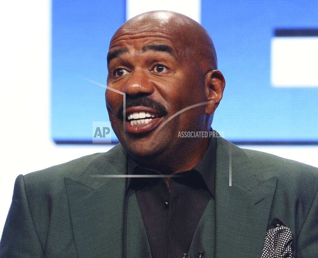 FILE - In this Aug. 3, 2017, file photo, host/executive producer Steve Harvey participates in the "Steve" panel during the NBC Television Critics Association Summer Press Tour in Beverly Hills, Calif. TV personality Steve Harvey will return as host of the NFL Honors show on Feb. 1, 2020, when The Associated Press hands out its individual league awards. (Photo by Willy Sanjuan/Invision/AP, File)