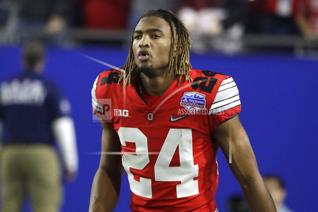 FILE - Ohio State cornerback Shaun Wade (24) is shown during the first half of the Fiesta Bowl NCAA college football game against Clemson, Saturday, Dec. 28, 2019, in Glendale, Ariz. Ohio State stars Shaun Wade and Wyatt Davis got tired of waiting for a decision on the football season and chose to opt out and begin preparing for the NFL draft. Wade, a preseason All-American and likely first-round pick in the 2021 draft, announced his decision Monday, Sept. 14, 2020, on Twitter, saying the Big Ten waited too long to decide what to do about playing.(AP Photo/Rick Scuteri, File).