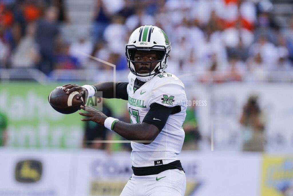 Otto Kitsinger Marshall quarterback Isaiah Green looks to pass during the first half of an NCAA college football game against Boise State in Boise, Idaho, Friday, Sept. 6, 2019. (AP Photo/Otto Kitsinger)