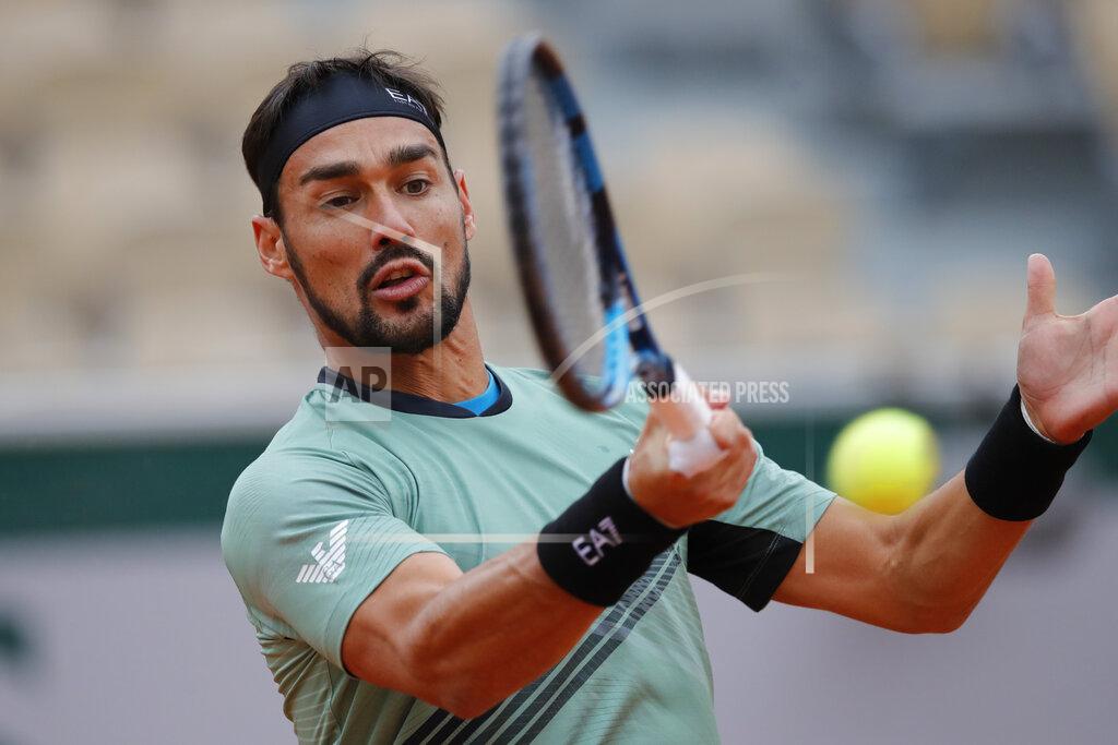 Christophe Ena Italy's Fabio Fognini plays a shot against Kazakhstan's Mikhail Kukushkin in the first round match of the French Open tennis tournament at the Roland Garros stadium in Paris, France, Monday, Sept. 28, 2020. (AP Photo/Christophe Ena)