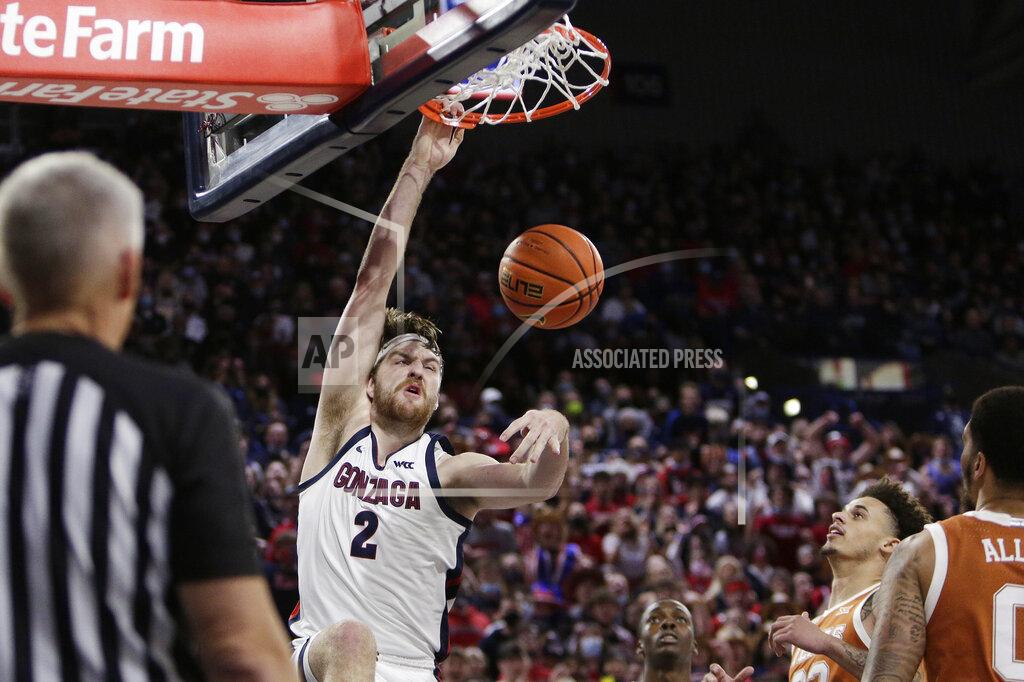Young Kwak Gonzaga forward Drew Timme dunks during the first half of the team's NCAA college basketball game against Texas, Saturday, Nov. 13, 2021, in Spokane, Wash. (AP Photo/Young Kwak)